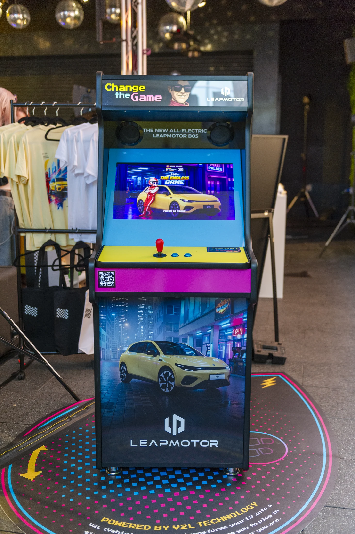 Custom Leapmotor cabinet on the Powered by V2L Technology event floor graphic