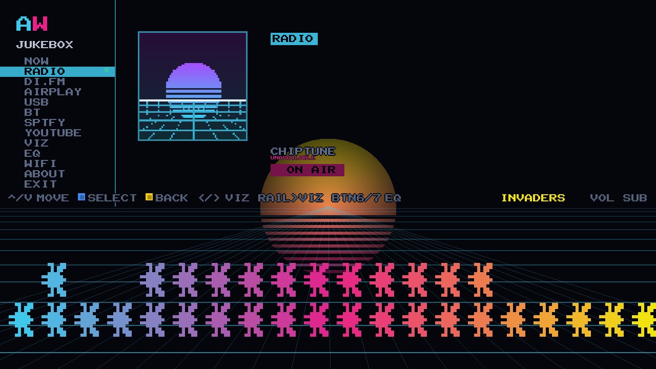 A chiptune station on air on the cabinet: the station name in big pixel type with the rolling now-playing title and the visualizer underneath
