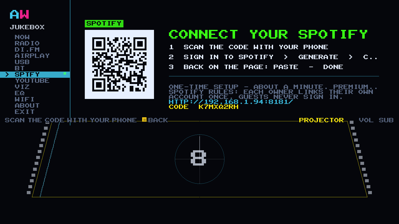 CONNECT YOUR SPOTIFY on the cabinet: a QR code on a white plate with three numbered steps and a short code to type