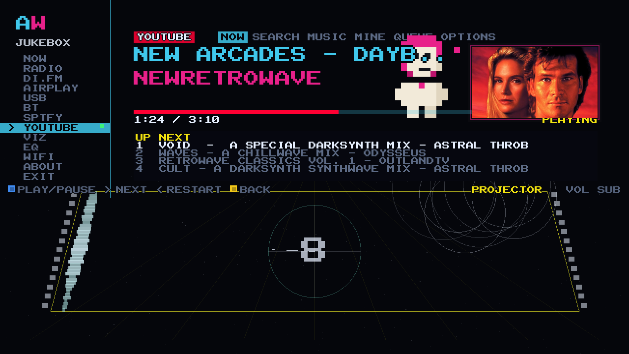 A YouTube video playing in the panel on the cabinet screen, with the title, channel, progress and the queue beside it